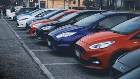parking lot with a variety of vehicles