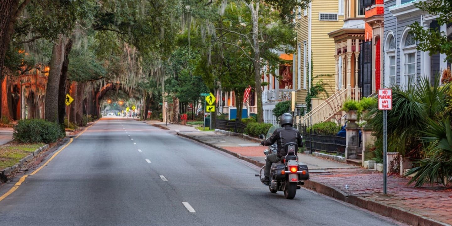 Rider in Georgia on an insured motorcycle traveling along a road