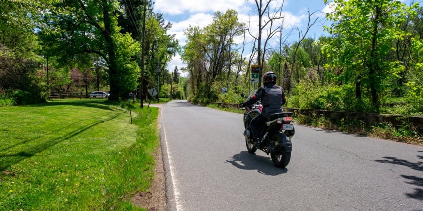 Rider riding an insured motorcycle through rural New Jersey