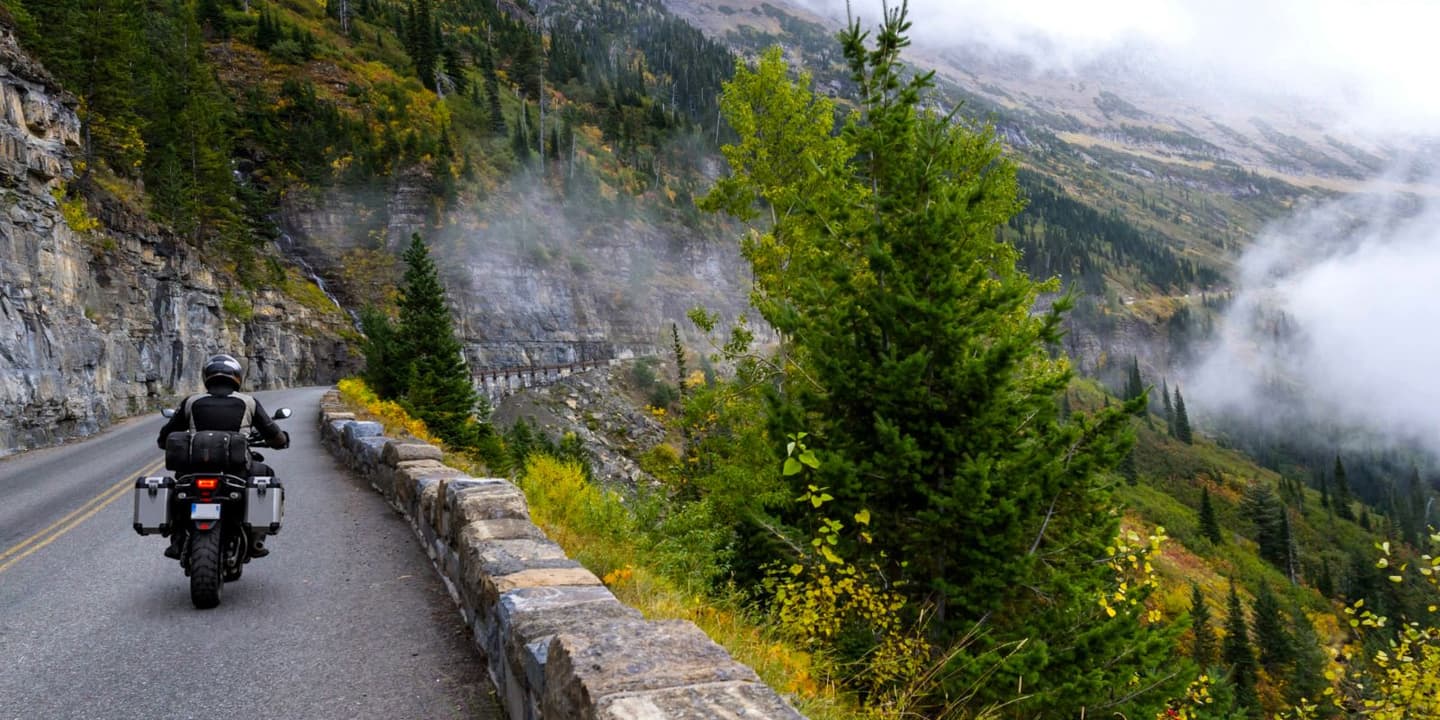 Motorcycle rider traveling through the scenic Montana countryside