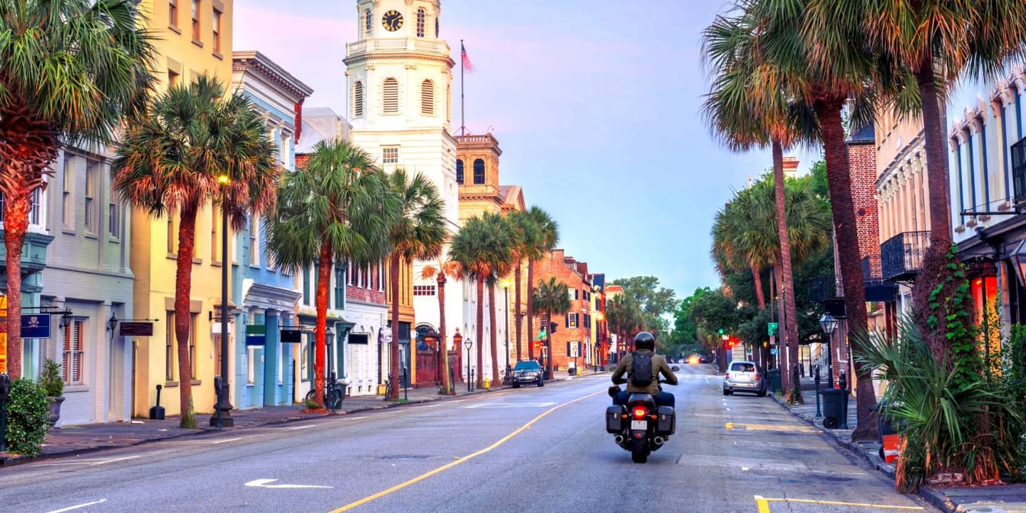 Motorcycle rider traveling through a historic area in South Carolina